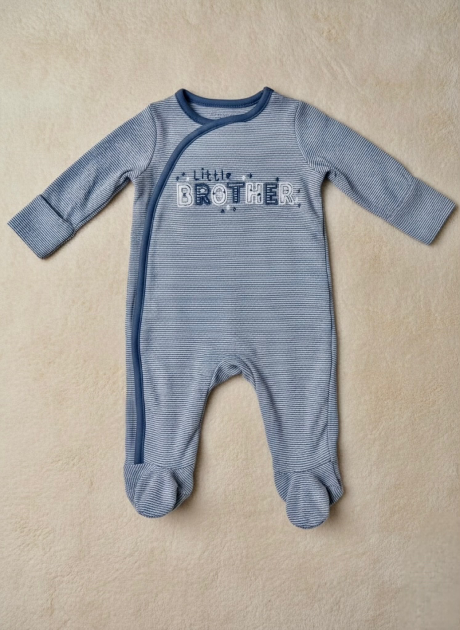 `Little brother’ blue sleepsuit