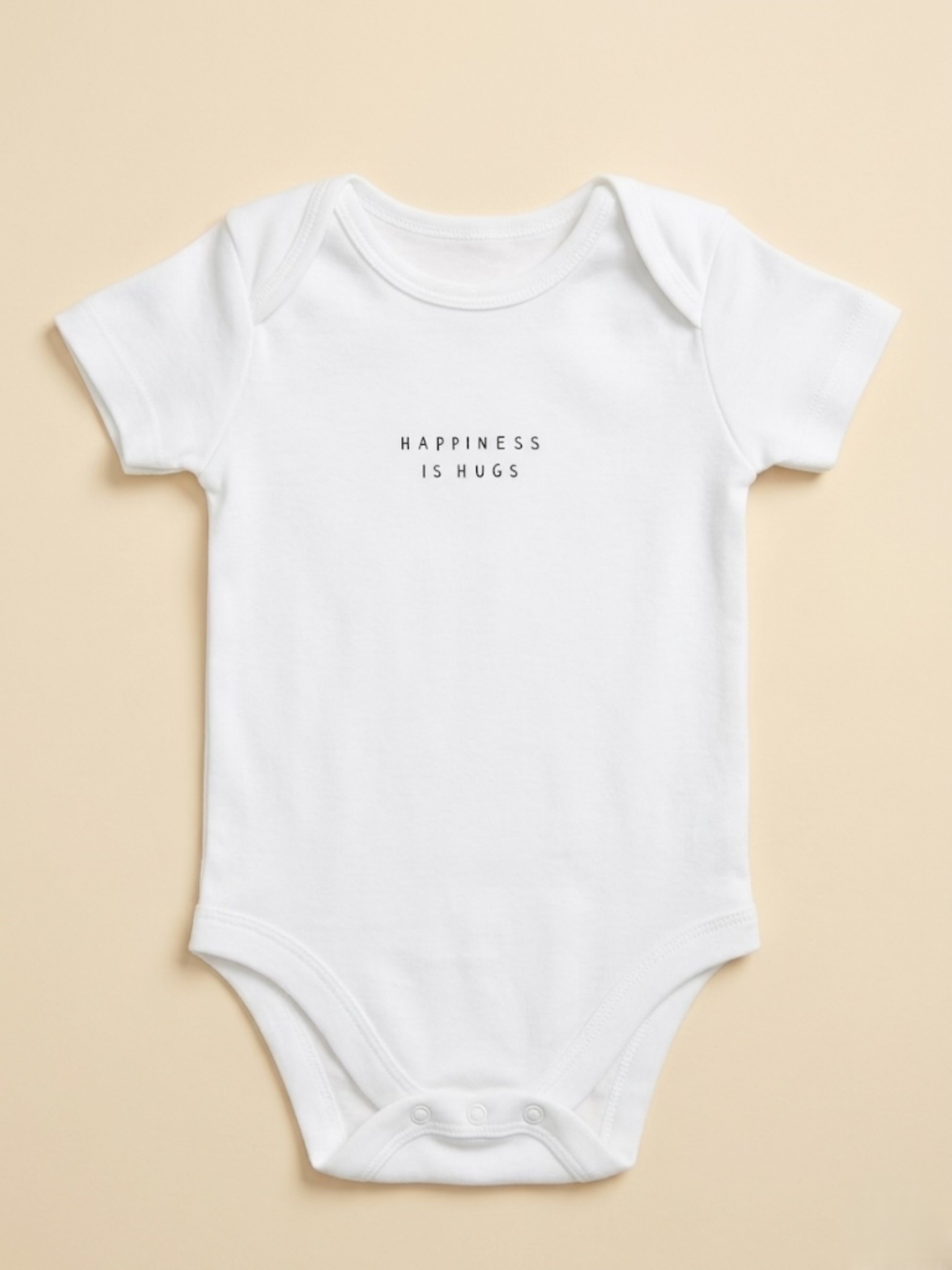 happiness is hugs onsie